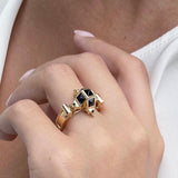 Close up black spinel and gold dome ring in 14K gold