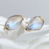 BYPASS RING WITH MOONSTONES AND 14K GOLD