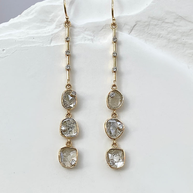 Diamond slice linear earrings with white diamond accents 14k gold