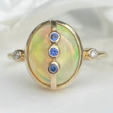 ETHIOPIAN OPAL AND TANZANITE RING