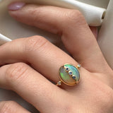 ETHIOPIAN OPAL AND TANZANITE RING