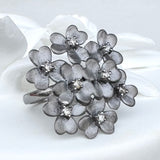 FLORAL CLUSTER RING WITH DIAMONDS  AND RHODIUM SILVER