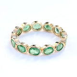 ETERNITY BAND WITH EMERALDS 18K GOLD