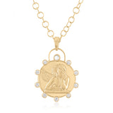 Cherub pendant in 14k gold with bezel set diamonds