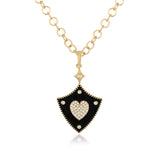 Diamond heart pendant surrounded with a black enamel shield 